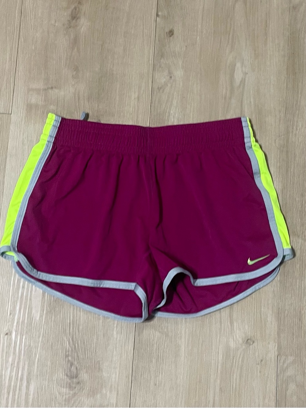 Nike Women’s Magenta Athletic Shorts with Neon Yellow Trim